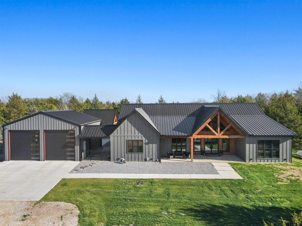 Brashear (BP-2001) Barndominium Floor Plan — 3 Bed, 2.5 Bath, 2,567 Sq Ft 2 Brashear BP-2001 completed barndominium build — covered porch and standing seam roofline