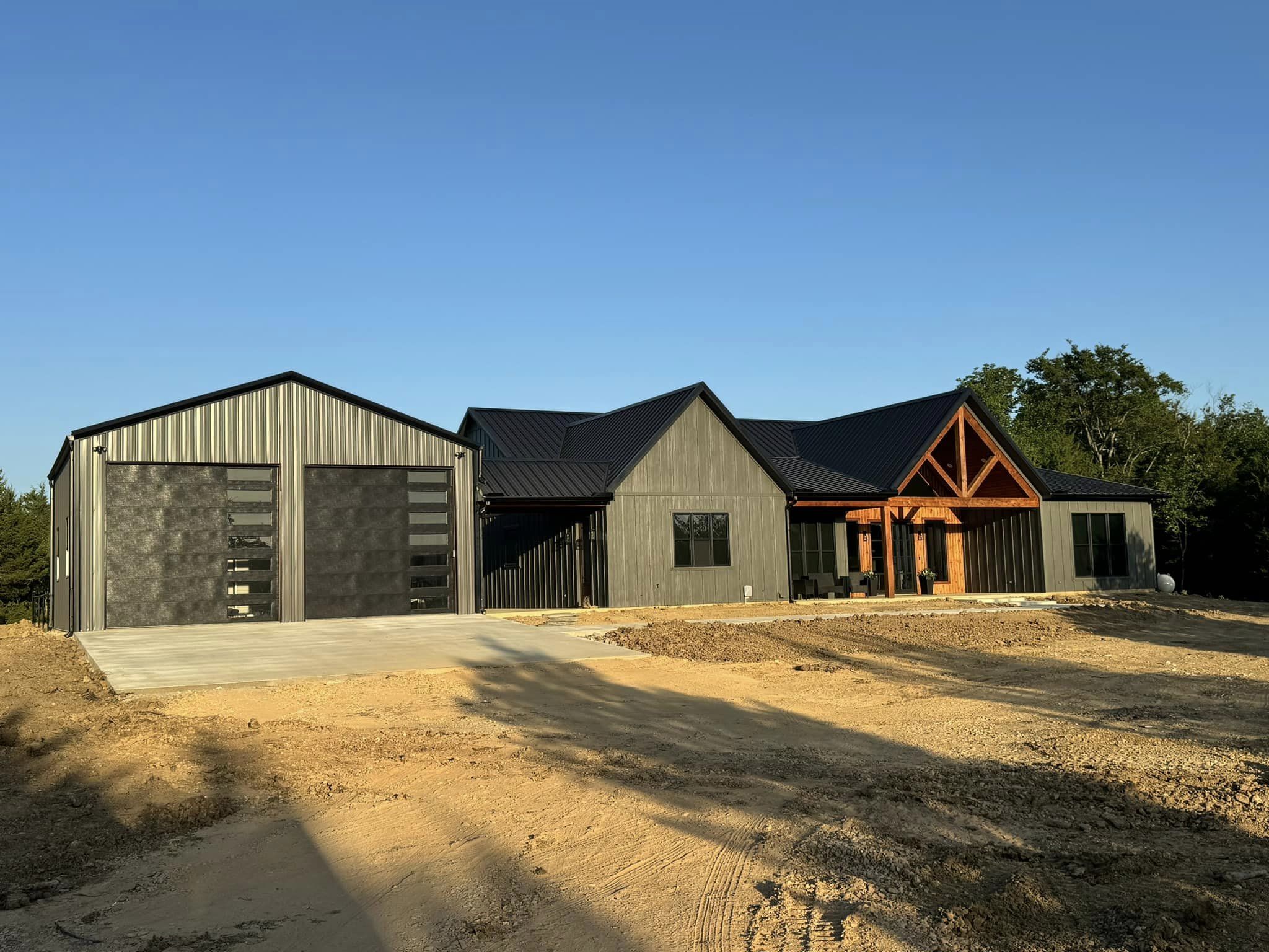 Brashear (BP-2001) Barndominium Floor Plan — 3 Bed, 2.5 Bath, 2,567 Sq Ft 2 Brashear BP-2001 barndominium exterior — completed client build showing the house, breezeway and detached garage