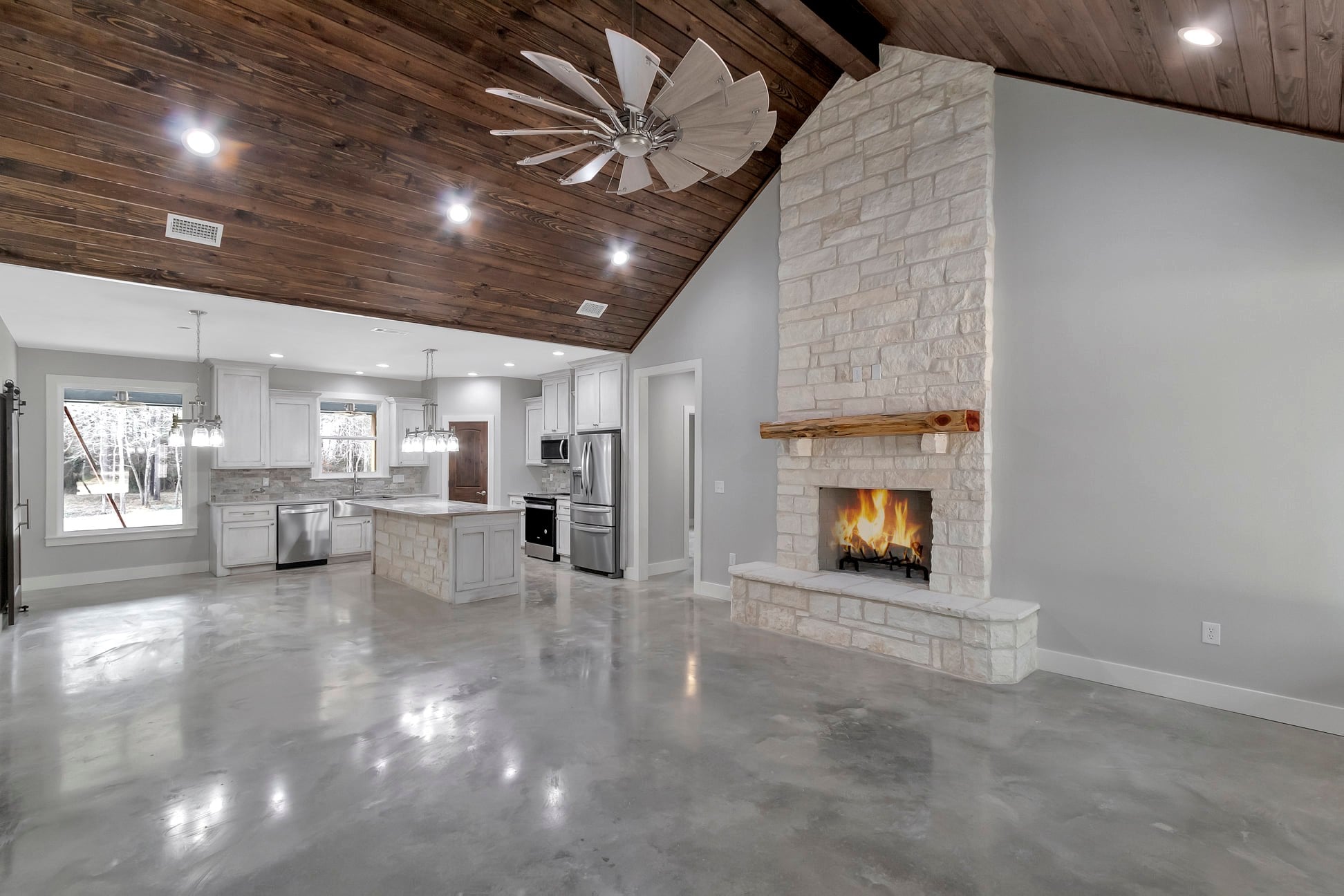 Radcliffe (RP-10002) Barndominium Floor Plan — 3 Bed, 2 Bath, 1,800 Sq Ft 4 Radcliffe RP-10002 vaulted ceiling over the open living area — finished barndominium build